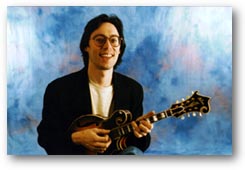 Larry Wexer holding a mandolin